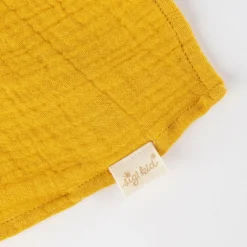 Doudou girafe en mousseline de coton jaune moutarde 39926<SIGIKID Online