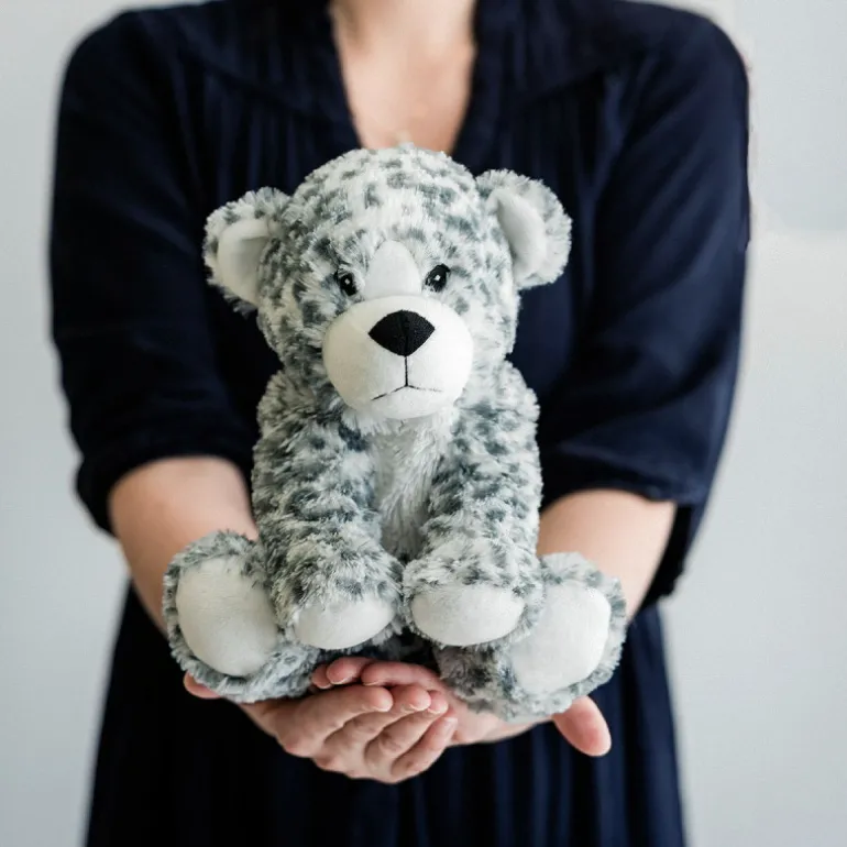 Peluche bouillotte Léopard des neiges Cozy Soframar<WARMIES New